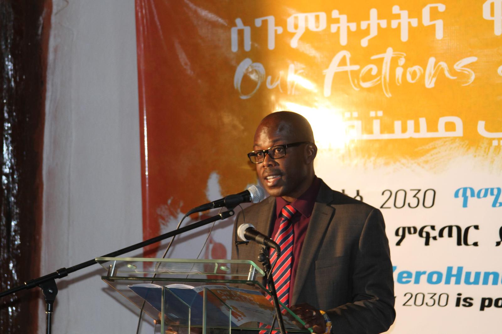 Dr. Tsetse delivering a keynote